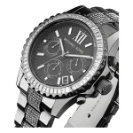 MICHAEL KORS MK5829-2 Close-up of a black Michael Kors watch featuring a studded bezel, three sub-dials, and a sleek stainless steel band.
